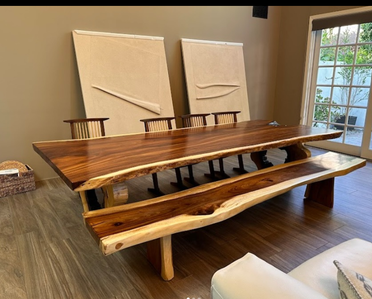 Large handcrafted live-edge dining table with matching bench